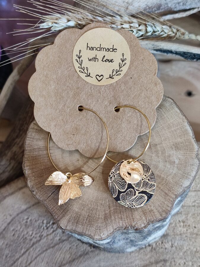 Boucles d'oreilles dépareillées ailes de fée doré rose