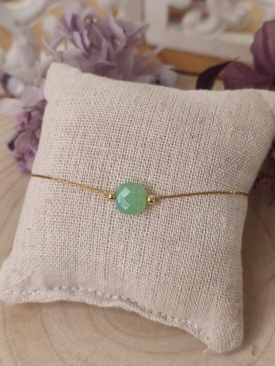 Bracelet acier inoxydable et sa grosse perle facettée vert d'eau 