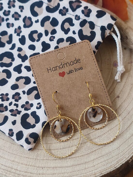 Boucles d'oreilles acier inoxydable et son joli pochon 🐆